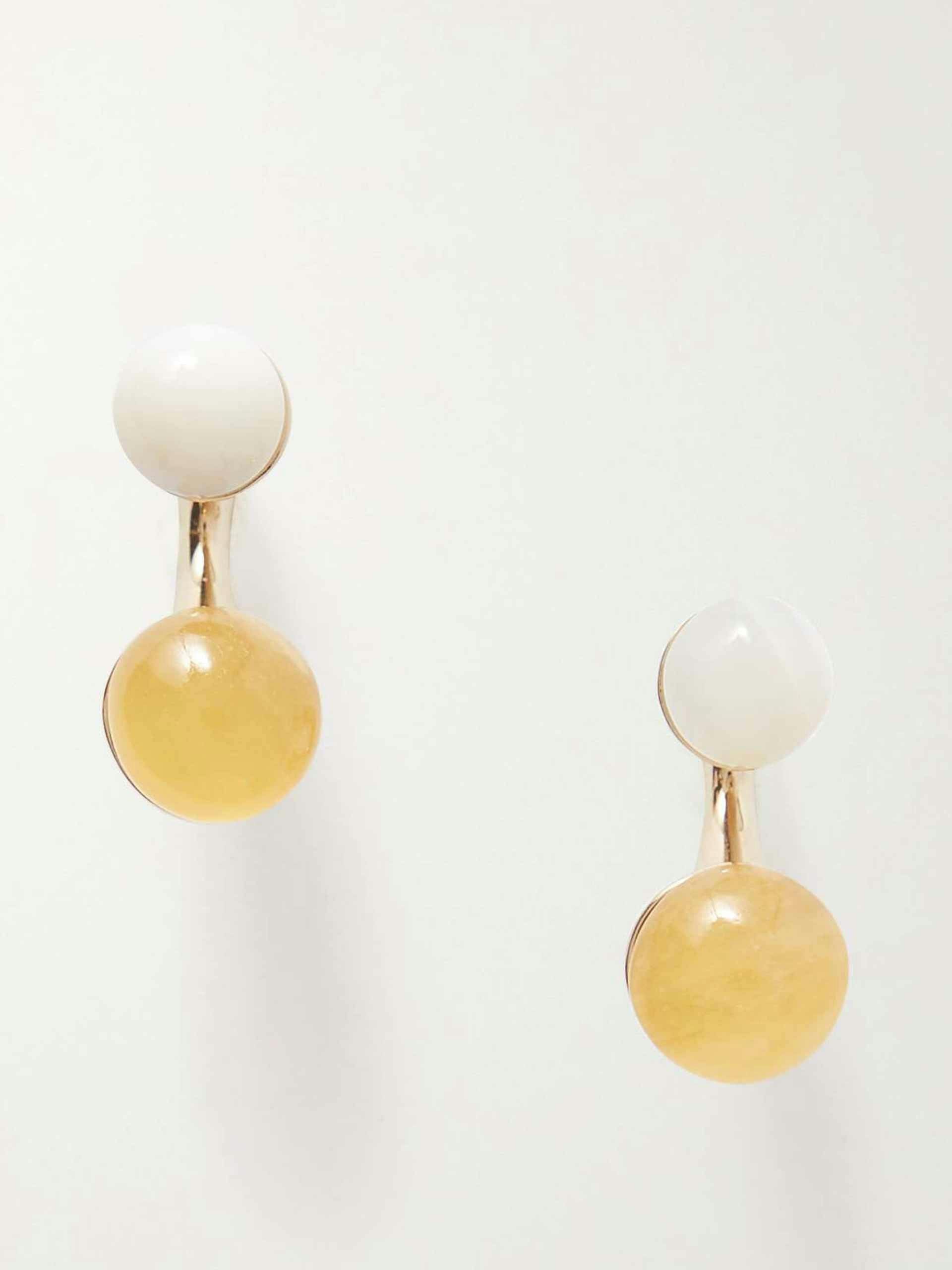 White and yellow earrings