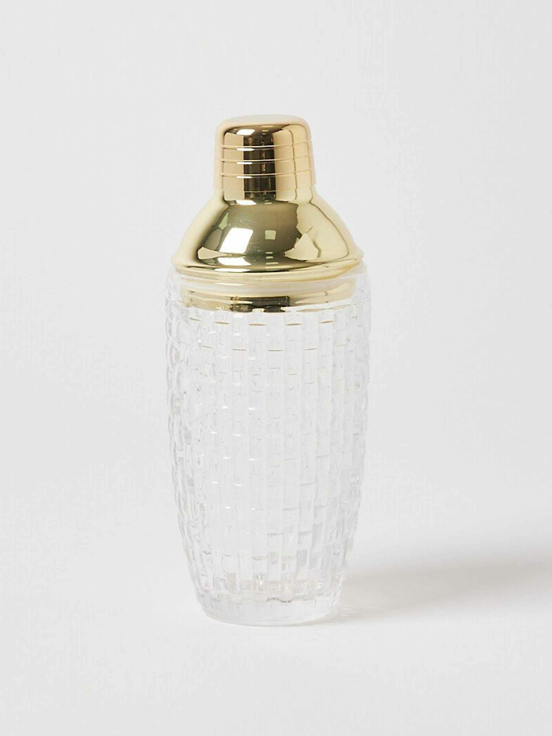 Gold metal and glass cocktail shaker