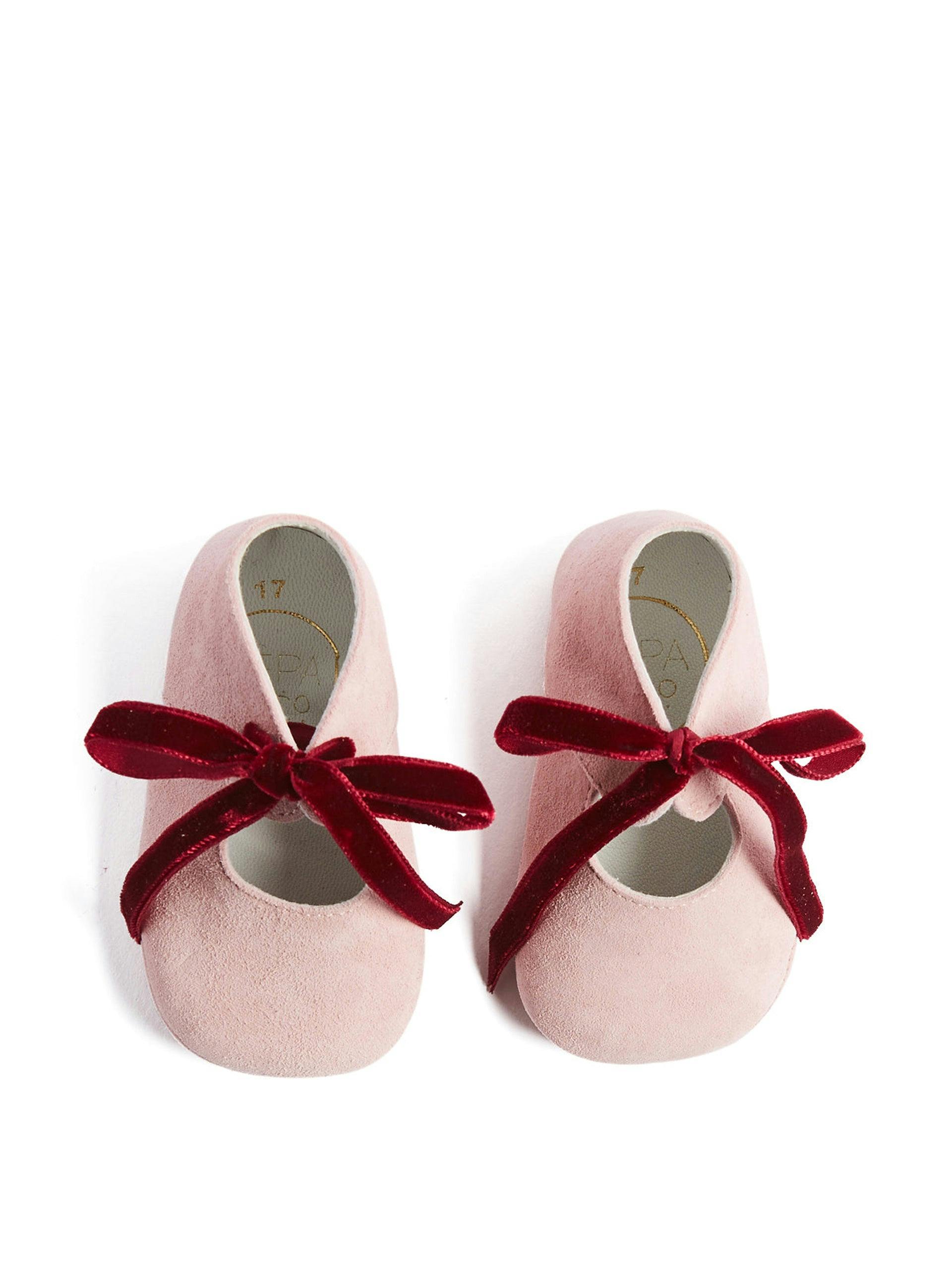 Pink suede shoes with velvet ribbon