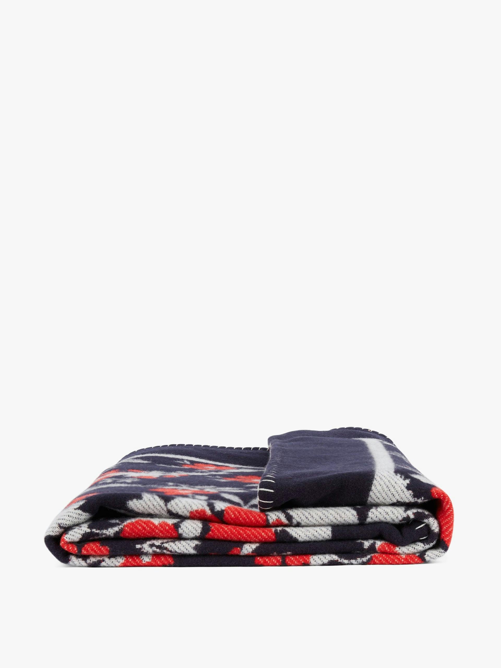 Navy and red Ottoline chine throw blanket