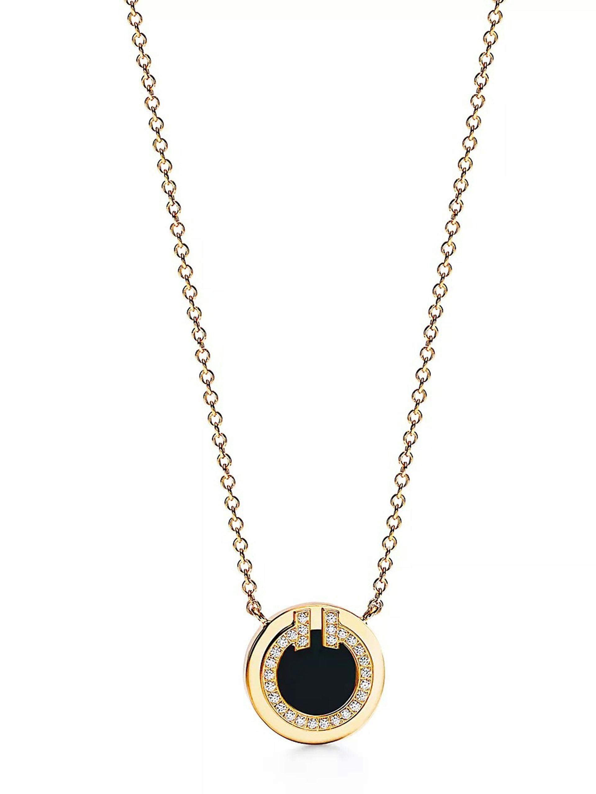 Diamond and black onyx circle pendant