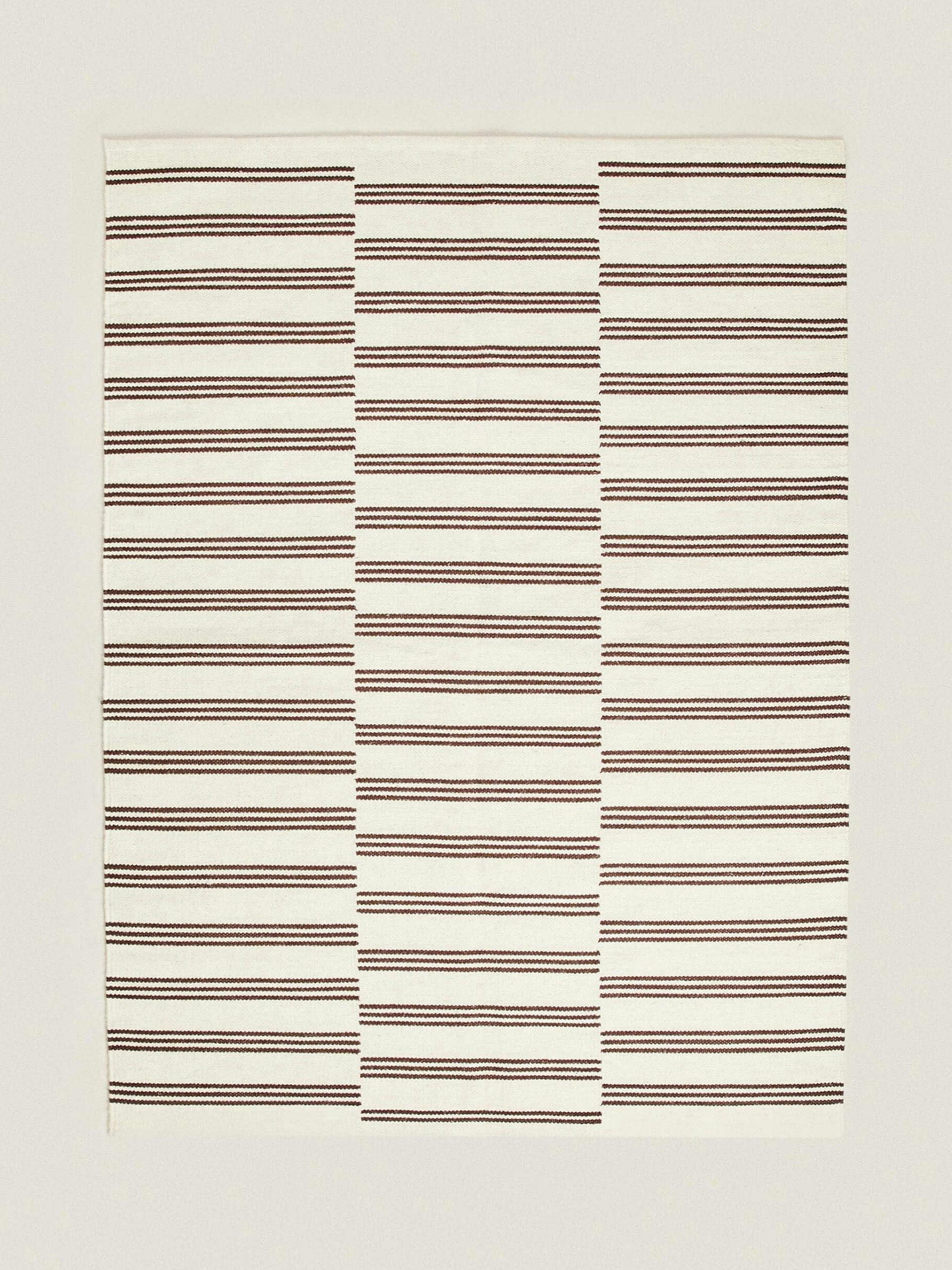 Offset striped rug