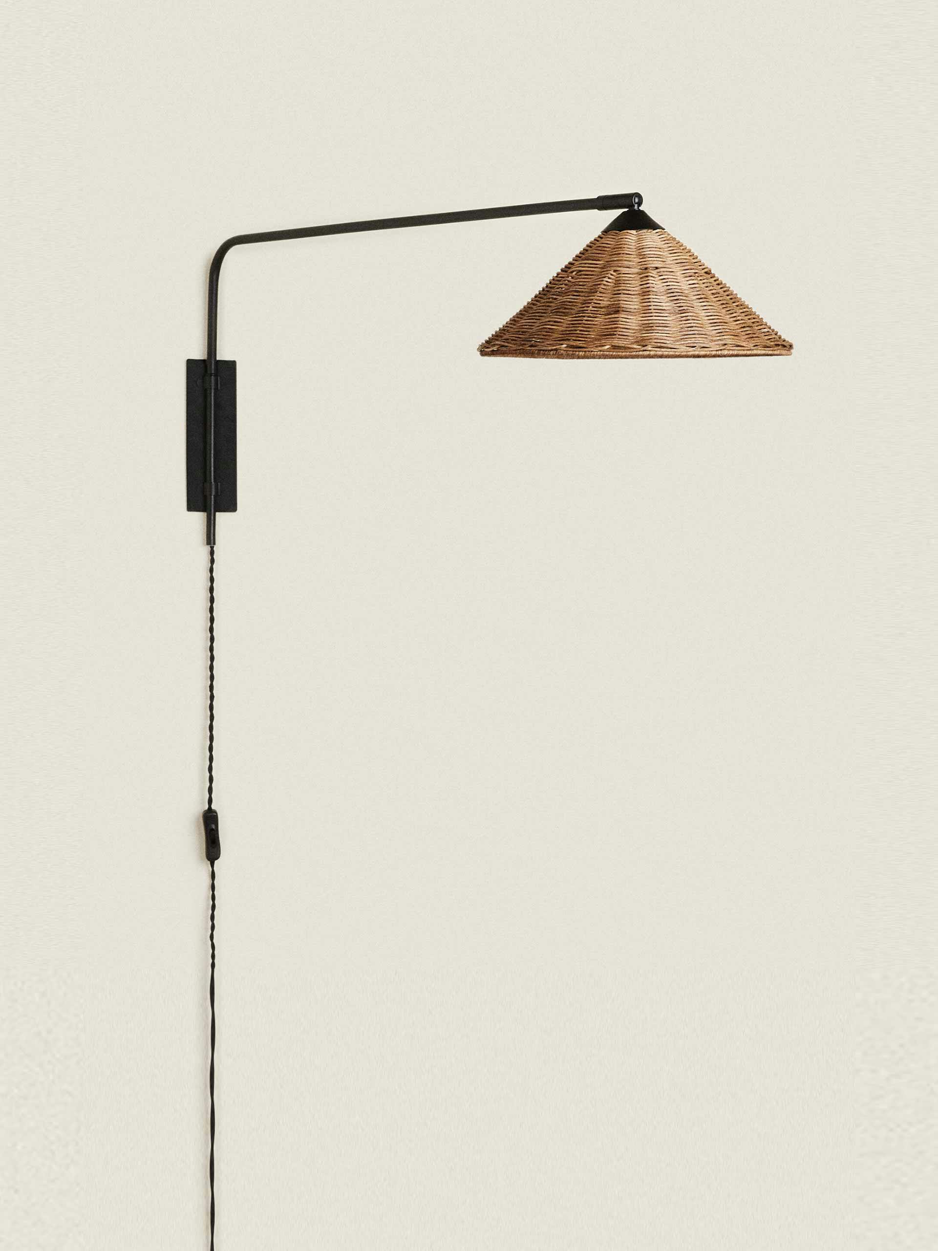 Black wall lamp with rattan lampshade