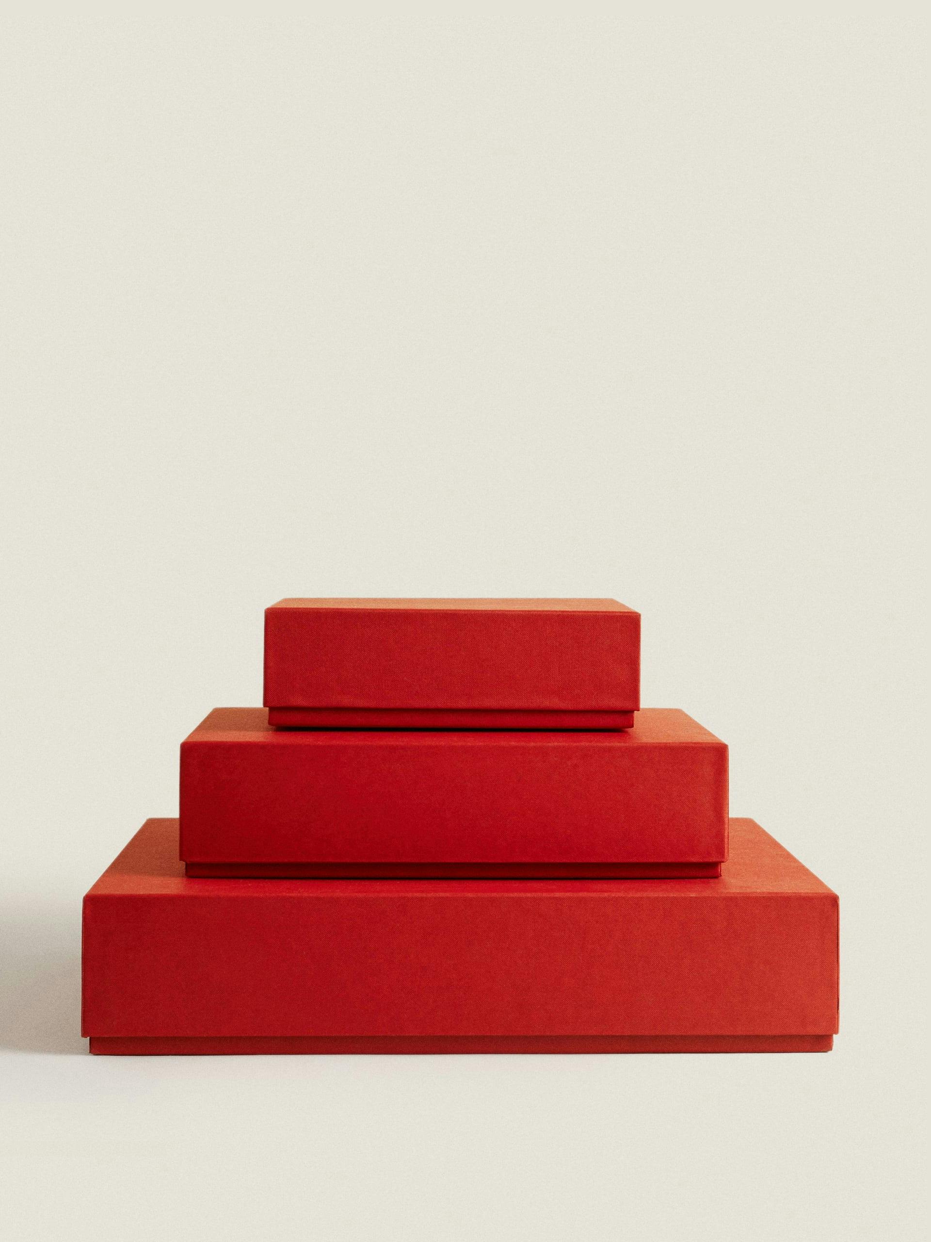 Small red cardboard filing box