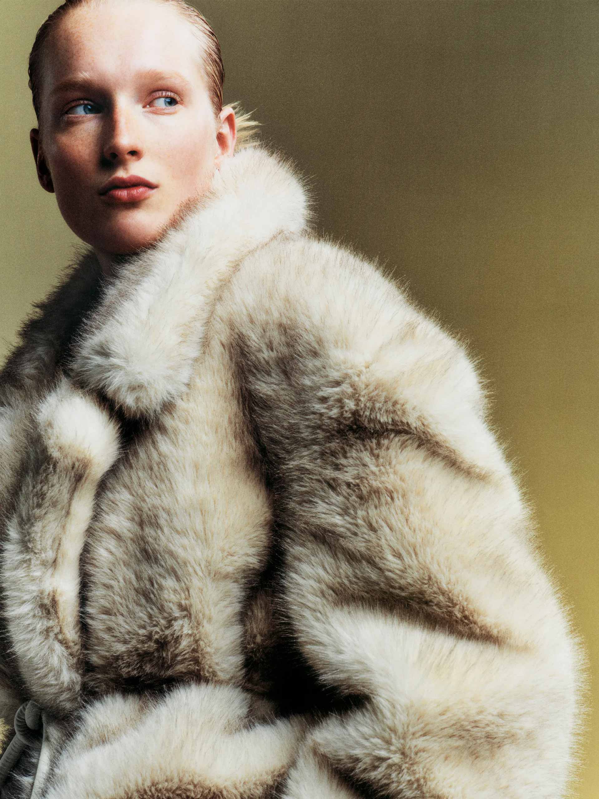 coats-holding-sportmax