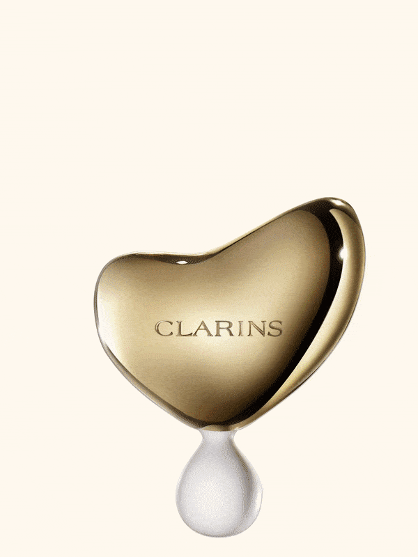collage-holding-clarins-gua-sha